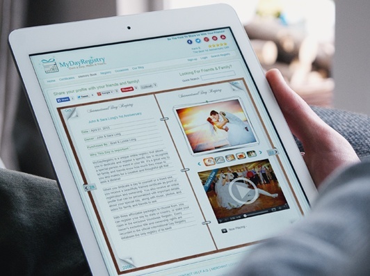 A couples anniversary memory book displayed on an ipad